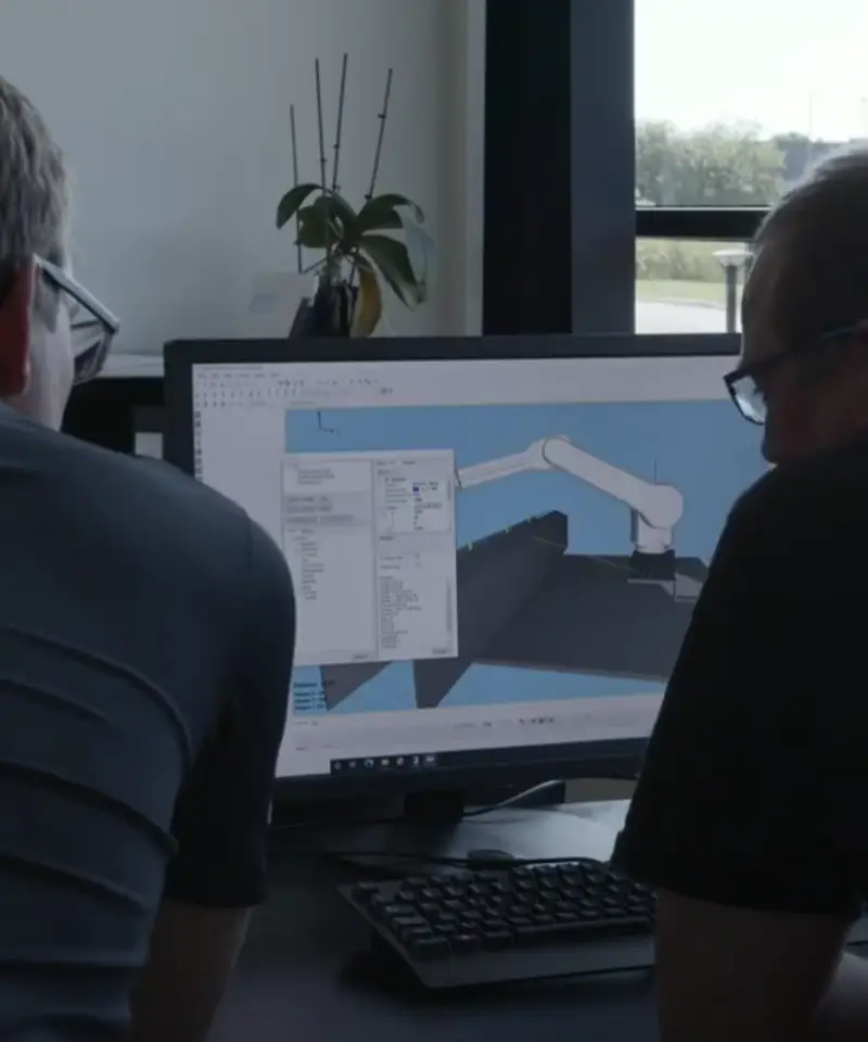 Programmierung eines Lackierroboters für optimale Sprühbahnen